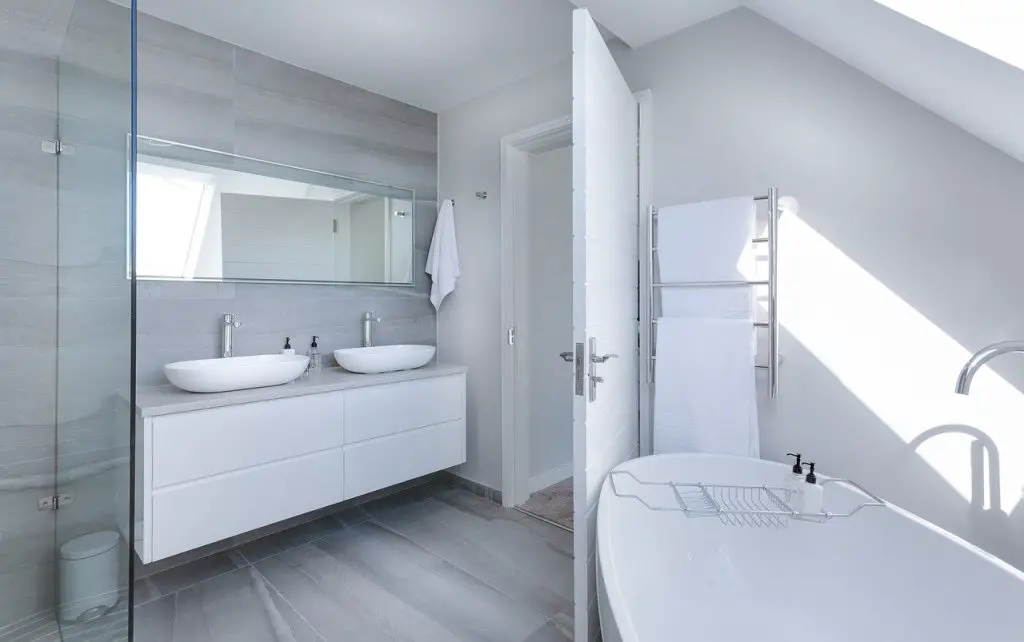 Small bathroom look bigger design tricks